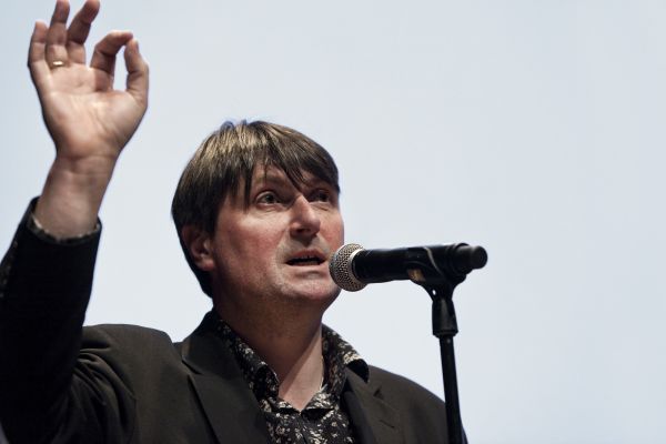 Simon Armitage is blessing the Crowd.